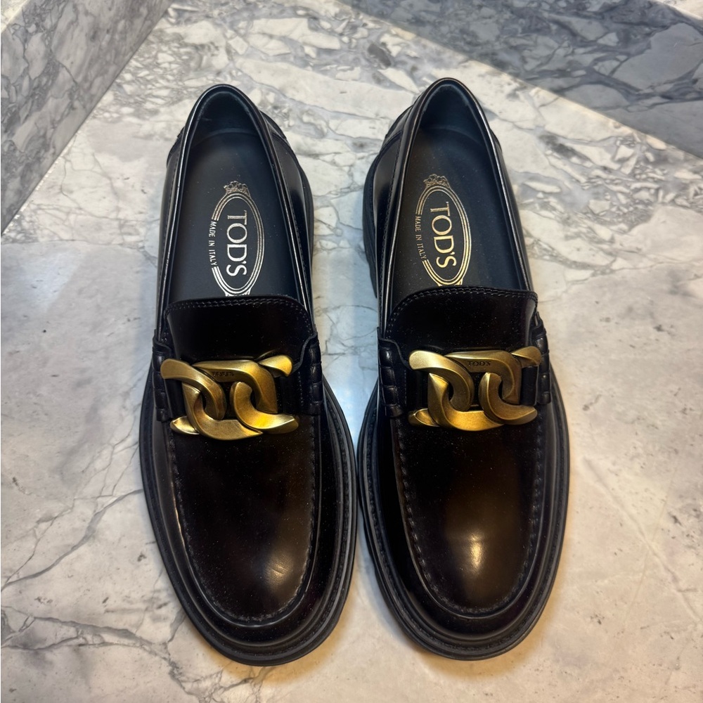 Tod's Black Loafers with Gold Chain Detail